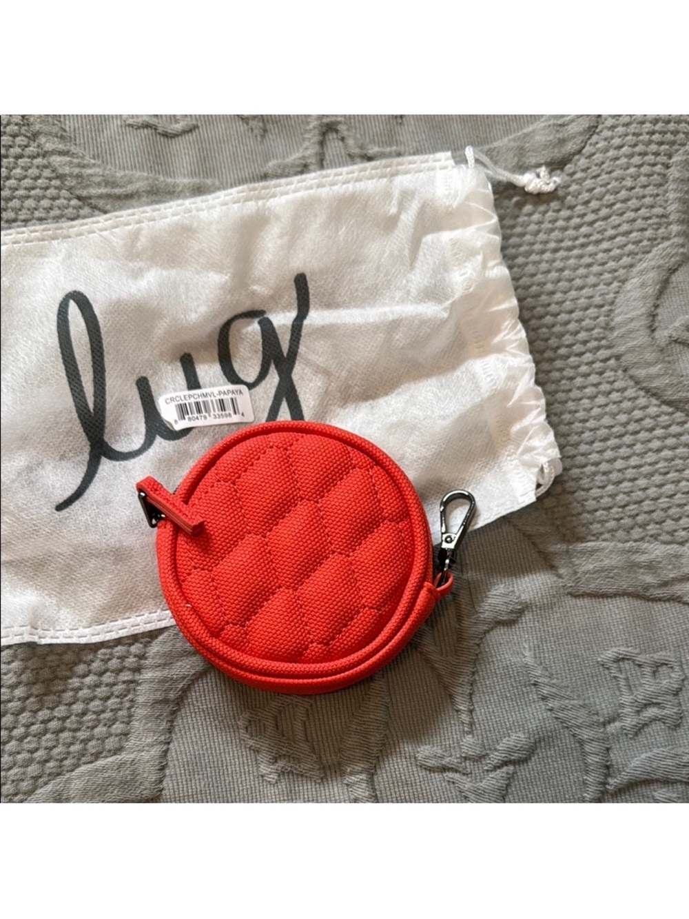 Lux Quilted Round Coin Pouch in Papaya. NWT and storage bag